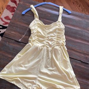 Never worn, short jumper, pale yellow